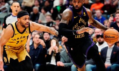 Russell leads Lakers past Raptors 128-111