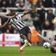 Newcastle United's Alexander Isak, centre, scores the opening goal during the English Premier League soccer match between Newcastle United and Tottenham Hotspur at St. James' Park in Newcastle, England, Saturday, April 13, 2024. (Owen Humphreys/PA via AP)