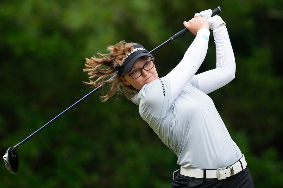 Brooke Henderson, of Canada, hits from the 16th tee during the third round of the Chevron...