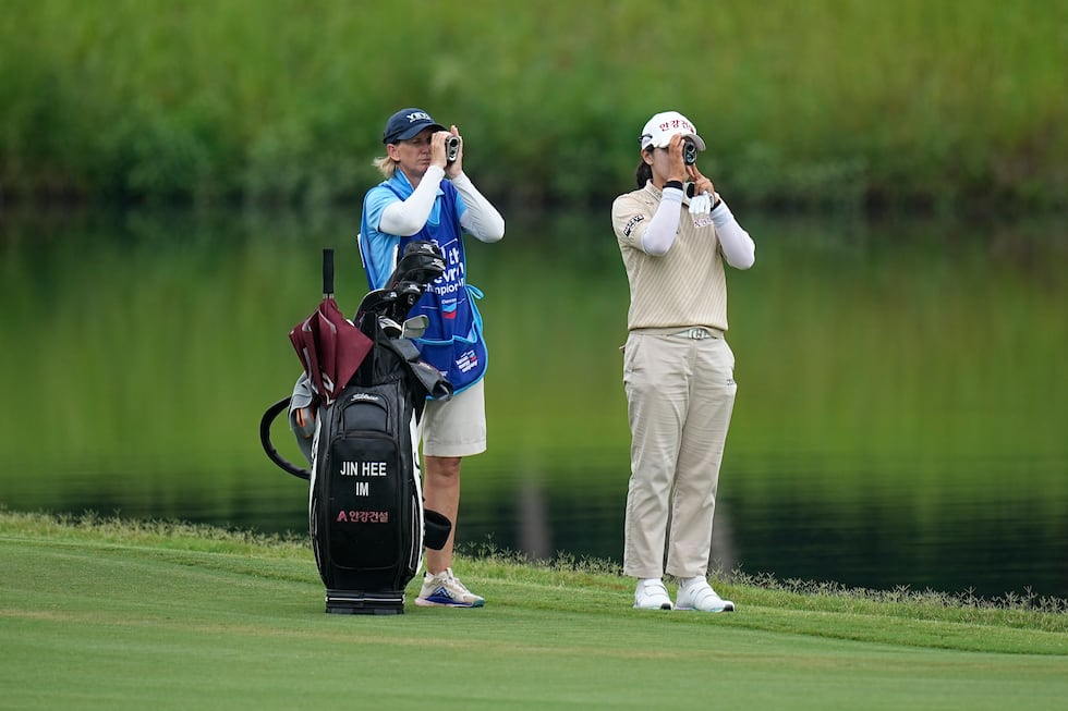 Jin Hee Im, of South Korea, measures her approach shot on the 10th hole during the third round...