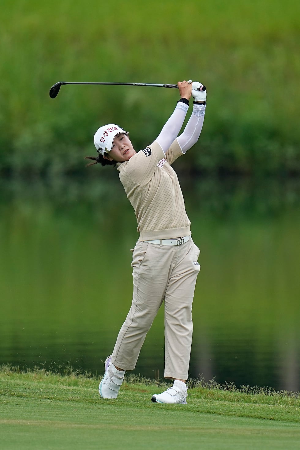 Jin Hee Im, of South Korea, hits from fairway to the 10th green during the third round of the...