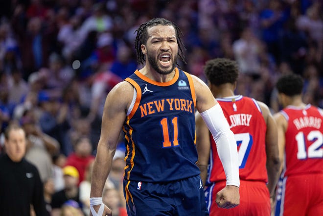 New York Knicks guard Jalen Brunson reacts after scoring against the Philadelphia 76ers during the fourth quarter of Game 4 of their first-round series.