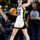 Caitlin Clark celebrates after defeating LSU in the finals of the Albany Regional in the 2024 NCAA Tournament at MVP Arena.