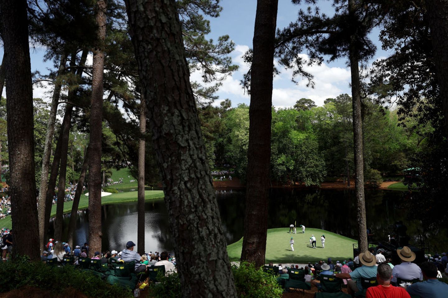 Masters 2024 live updates: Weather delays opening round at Augusta National, odds, picks, tee times and more