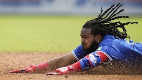 Blue Jays slugger Vladimir Guerrero Jr. slides into a base.