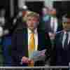 Former U.S. President Donald Trump with attorney Todd Blanche speaks to the media during his trial for allegedly covering up hush money payments, at Manhattan Criminal Court on Tuesday in New York City.