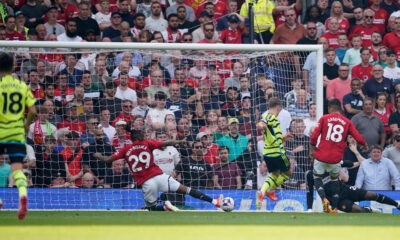 Arsenal defeats Manchester United takes title race with Man City to final day of Premier League season