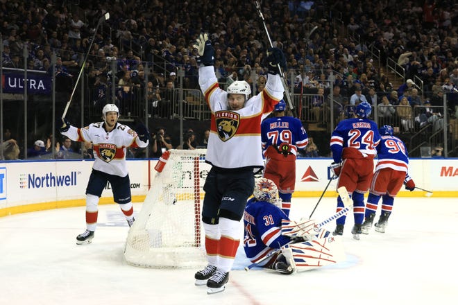 NEW YORK, NEW YORK - MAY 30: Vladimir Tarasenko #10 of the Florida Panthers celebrates after a goal by Anton Lundell #15 during the third period against the New York Rangers in Game Five of the Eastern Conference Final of the 2024 Stanley Cup Playoffs at Madison Square Garden on May 30, 2024 in New York City.