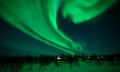 The Aurora Borealis, commonly known as the Northern Lights, are seen in March in the sky above Kiruna, Sweden. The area is widely regarded as one of the best places in the world to see the phenomenon, which occurs when energized particles from the sun hit the Earth's upper atmosphere. (Photo by Leon Neal/Getty Images)