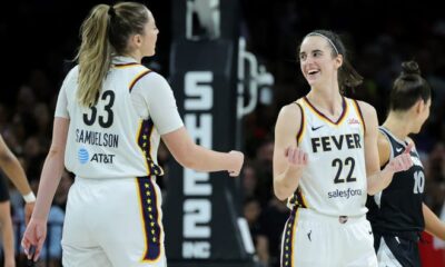 Caitlin Clark celebrates with Indiana Fever teammate Katie Lou Samuelson during a 99-80 loss to the Las Vegas Aces on May 25.