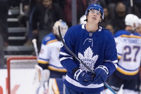 Maple Leafs winger Mitch Marner looks to the rafters during a game.