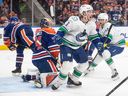 Canucks' Brock Boeser celebrates a goal against the Oilers and goalie Stuart Skinner last week. Boeser, who has 7 goals and 5 assists in this year's playoffs, reportedly has a blood-clot issue.