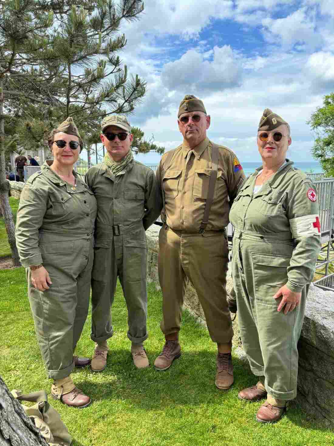 Jacqui Patrice with his with Dorothé and some friends. They are dressed as U.S. soldiers, a WAC (Women’s Army Corps) and a nurse.