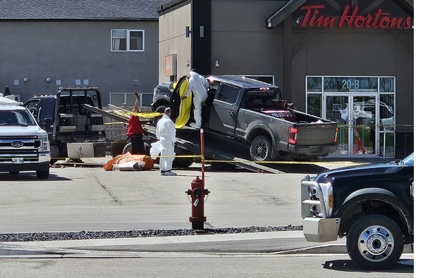 A vehicle is towed from a crime scene in Niverville.