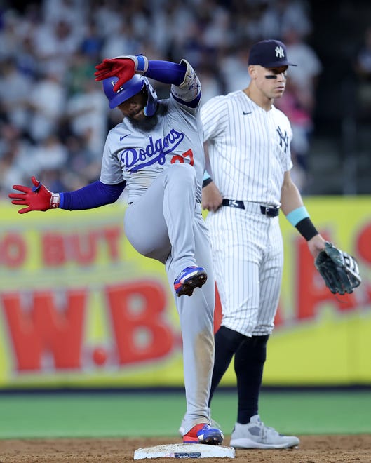 Jun 7, 2024; Bronx, New York, USA; Los Angeles Dodgers left fielder Teoscar Hernandez (37) reacts after his two run double against the New York Yankees during the eleventh inning at Yankee Stadium. Mandatory Credit: Brad Penner-USA TODAY Sports