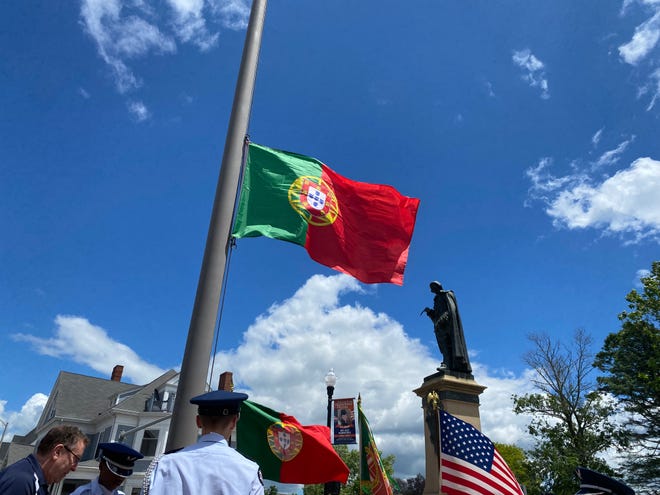 Members of the Taunton Air Force Junior ROTC raise the Portuguese flag outside Taunton City Hall on Saturday, June 8 2024.