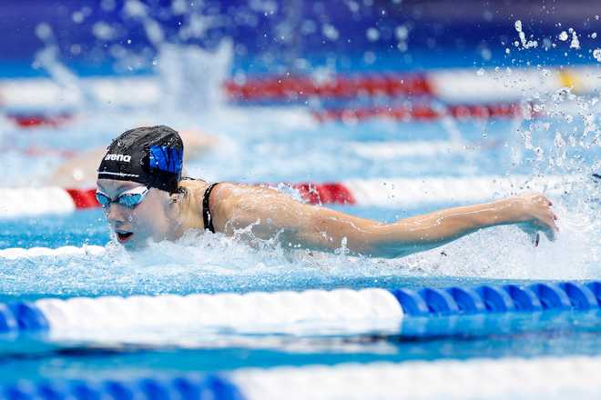 Gretchen Walsh competes in the women's 100m butterfly semifinal.