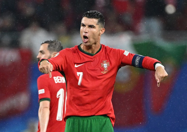 Ronaldo points down