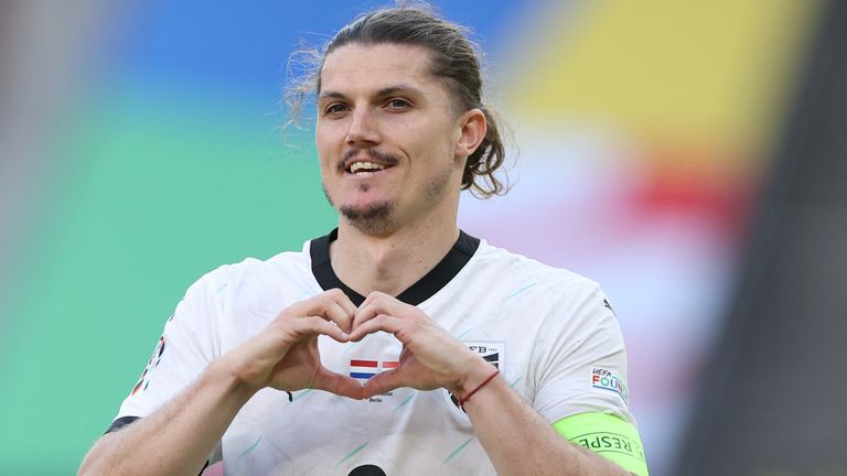 Marcel Sabitzer celebrates after restoring Austria's lead against the Netherlands