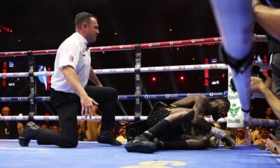 Zhilei Zhang knocked out Deontay Wilder in the fifth round of their heavyweight bout.