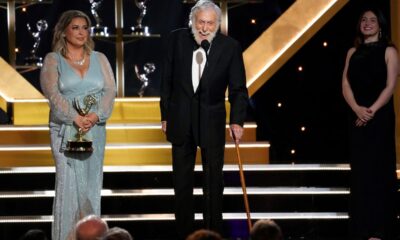 Dick Van Dyke accepts the award for outstanding guest performance in a daytime drama series for "Days of our Lives" during the 51st Daytime Emmy Awards on Friday, June 7, 2024, at the Westin Bonaventure in Los Angeles. Arlene Silver looks on from left. (AP Photo/Chris Pizzello)