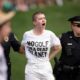 Protesters storm green in front of Scottie Scheffler, Tom Kim to delay ending of Travelers Championship | Golf News and Tour Information