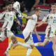 Hungary's Kevin Csoboth, center, celebrates after scoring the opening goal during a Group A match between Scotland and Hungary at the Euro 2024 soccer tournament in Stuttgart, Germany, Sunday, June 23, 2024. (AP Photo/Matthias Schrader)