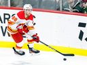 Andrew Mangiapane of the Calgary Flames skates with the puck against the Minnesota Wild at Xcel Energy Center on January 2, 2024 in St Paul, Minnesota. 