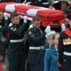 Under grey skies and rain, N.L. entombs its Unknown Soldier in solemn ceremony at war memorial