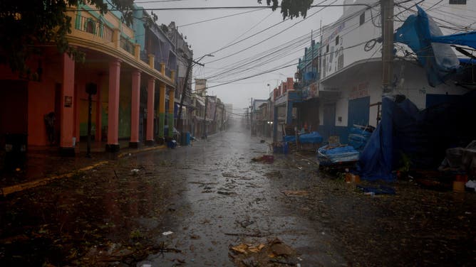 KINGSTON, JAMAICA - JULY 03: An empty street as people remain indoors as wind and rain from Hurricane Beryl is felt on July 03, 2024, in Kingston, Jamaica. Beryl has caused widespread damage in several island nations as it continues to cross the Caribbean. (Photo by Joe Raedle/Getty Images)