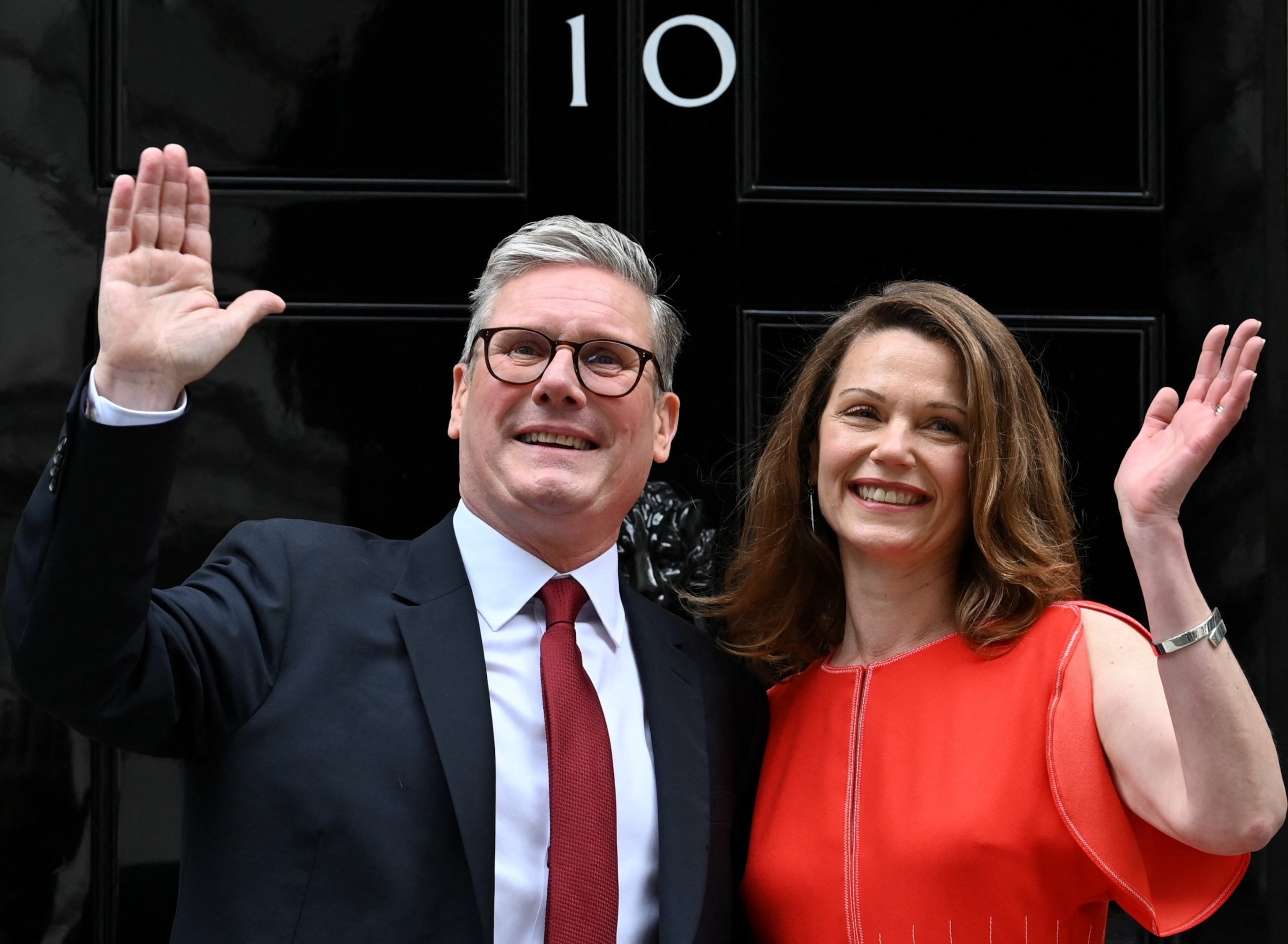 PHOTO: Britain's incoming Prime Minister Keir Starmer and leader of the Labour Party, and his wife Victoria pose on the steps of 10 Downing Street in London, July 5, 2024.