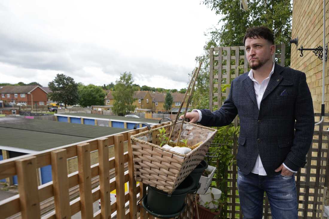 Dominic Watters, a single dad and founder of the Food is Care campaign, poses for a photo outside his home in Canterbury, England, June 10. Since calling an election, Prime Minister Rishi Sunak has campaigned saying the economy is turning a corner, inflation is down and things are looking up. But millions across the U.K. still feel the squeeze from high food, energy and housing prices.