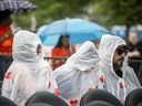 Dark clouds and bursts of rain moved along the Ottawa River, and passed over Ottawa Bluesfest Saturday, July 6, 2024.