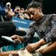 Simone Biles hurts her leg in Olympic gymnastics qualifying but finishes 1st anyway