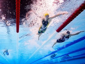 Ariarne Titmus of Team Australia and Summer McIntosh of Team Canada compete in the Women's 400m Freestyle Final.