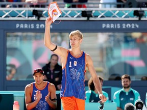 Steven van de Velde of Team Netherlands reacts during the Men's Preliminary Phase - Pool B match between Team Netherlands and Team Italy on Day 2 of the Olympic Games.