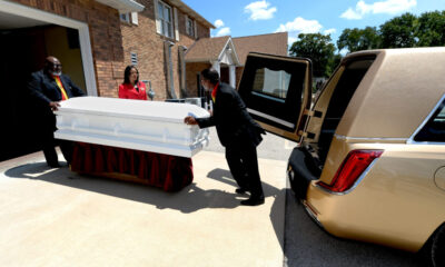 The coffin of Sonya Massey is loaded into a hearse after her funeral at Ruby's Funeral Services and Chapel in Springfield