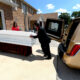 The coffin of Sonya Massey is loaded into a hearse after her funeral at Ruby's Funeral Services and Chapel in Springfield