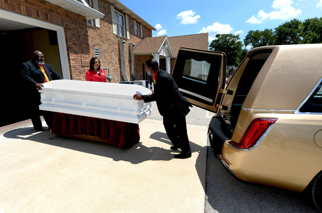 The coffin of Sonya Massey is loaded into a hearse after her funeral at Ruby's Funeral Services and Chapel in Springfield