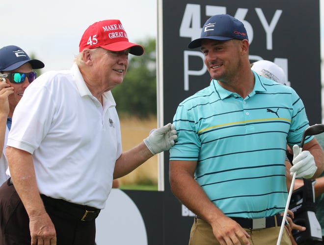 Former President Donald Trump with Bryson DeChambeau during the 2022 LIV Golf Bedminster pro-am at Trump National in Bedminster, New Jersey. (The Record)