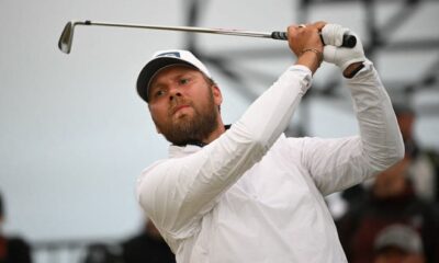 England's Daniel Brown watches his iron shot from the 17th tee on the opening day of the 152nd British Open Golf Championship at Royal Troon on the south west coast of Scotland on July 18, 2024.