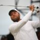 England's Daniel Brown watches his iron shot from the 17th tee on the opening day of the 152nd British Open Golf Championship at Royal Troon on the south west coast of Scotland on July 18, 2024.