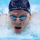 France’s Leon Marchand delights home crowd by winning 400m individual medley gold in Olympic record