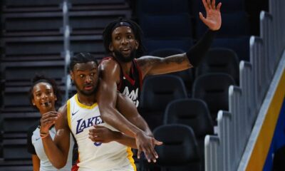 Bronny James battles with Miami Heat center Warren Washington during Wednesday's game.