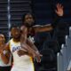 Bronny James battles with Miami Heat center Warren Washington during Wednesday's game.