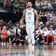 Steph Curry celebrates after scoring against Canada.