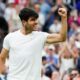 Carlos Alcaraz of Spain celebrates after defeating Tommy Paul of the United States in their quarterfinal match at the Wimbledon tennis championships in London, Tuesday, July 9, 2024. (AP Photo/Kirsty Wigglesworth)