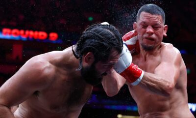 Jorge Masvidal, left, and Nate Diaz fight during the ninth round.