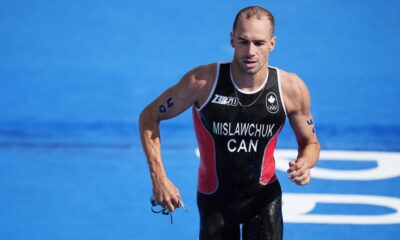 Tyler Mislawchuk runs during the triathlon