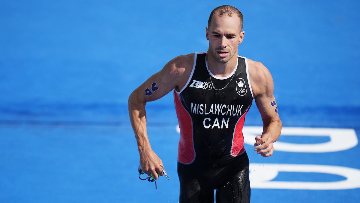 Tyler Mislawchuk runs during the triathlon